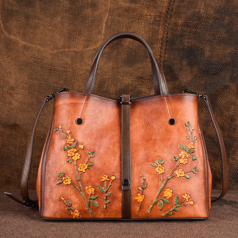 Vrouwen Bloemmotief Reliëf Plantaardig Gelooid Lederen Crossbody Tassen Retro Grote Capaciteit Lederen Schoudertas Handtas