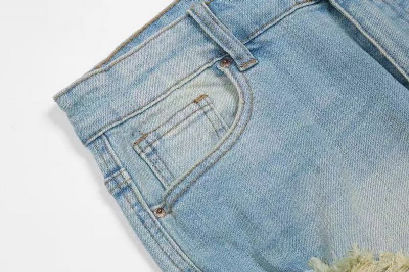 Vernietigde Ritsbandjes In Gewassen Noodlijdende Jeans