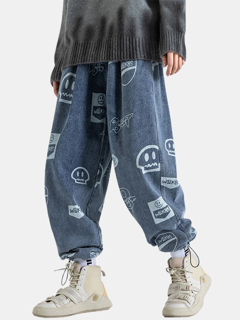 Denim Broek Met All-over Cartoon Grimasprint En Trekkoord Manchetten Voor Heren