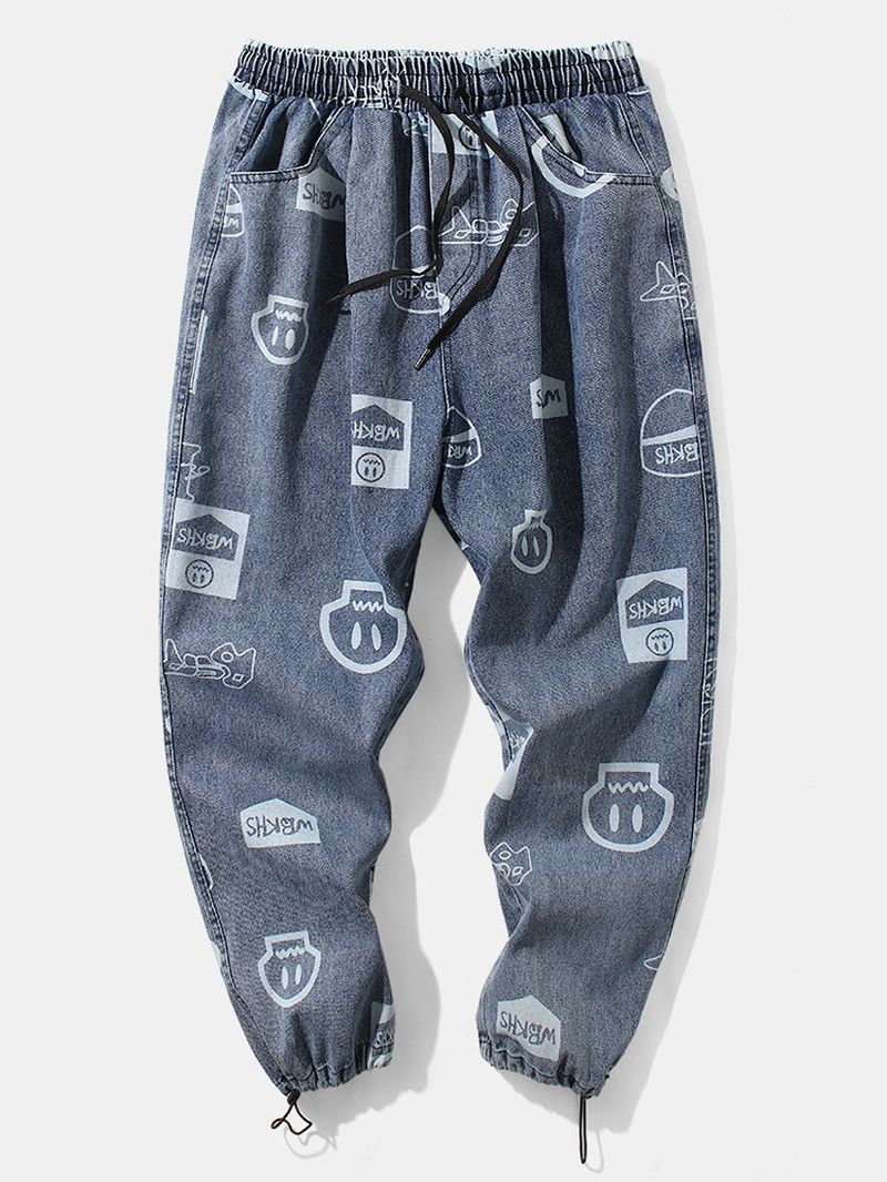 Denim Broek Met All-over Cartoon Grimasprint En Trekkoord Manchetten Voor Heren